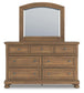Feddinger Queen Storage Sleigh Bed with Mirrored Dresser